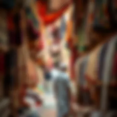 Traditional textiles and garments hanging in a bustling souk
