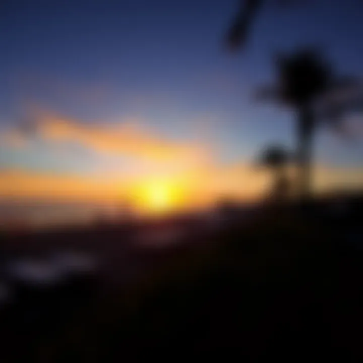 Sunset Bliss at Hudayriat Public Beach A vibrant sunset at Hudayriat Public Beach, casting a warm glow over the landscape